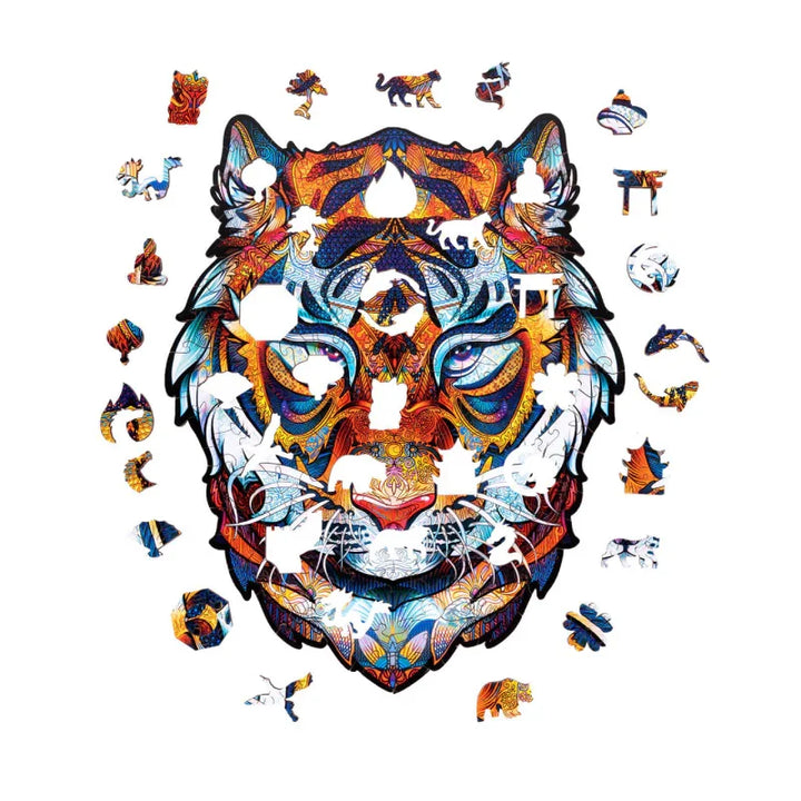 Ein lebendiges, farbenfrohes Puzzle mit einem Tigergesicht, bei dem mehrere Teile fehlen und verschiedene tierförmige Teile verstreut herumliegen.